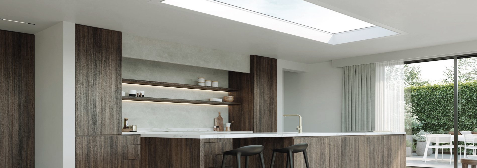 Long skylight lighting a dark wood kitchen